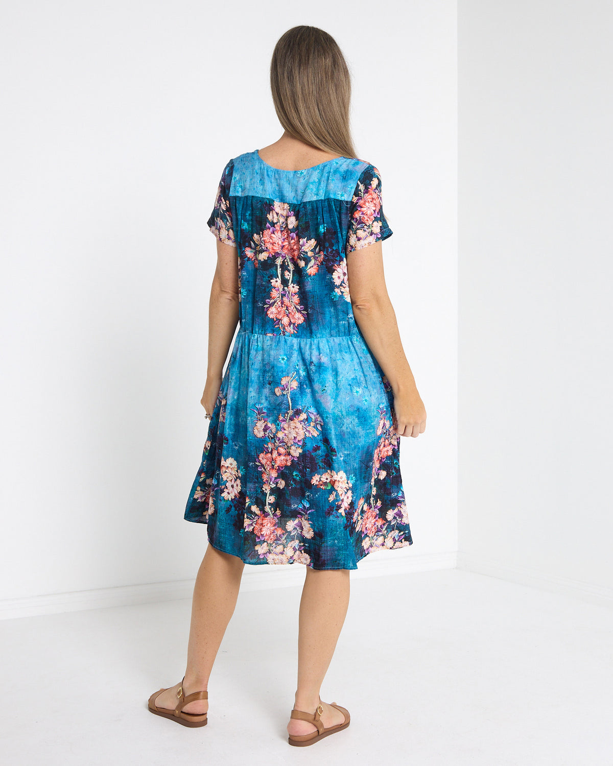 Emery Pintuck Dress in blue lagoon, back view