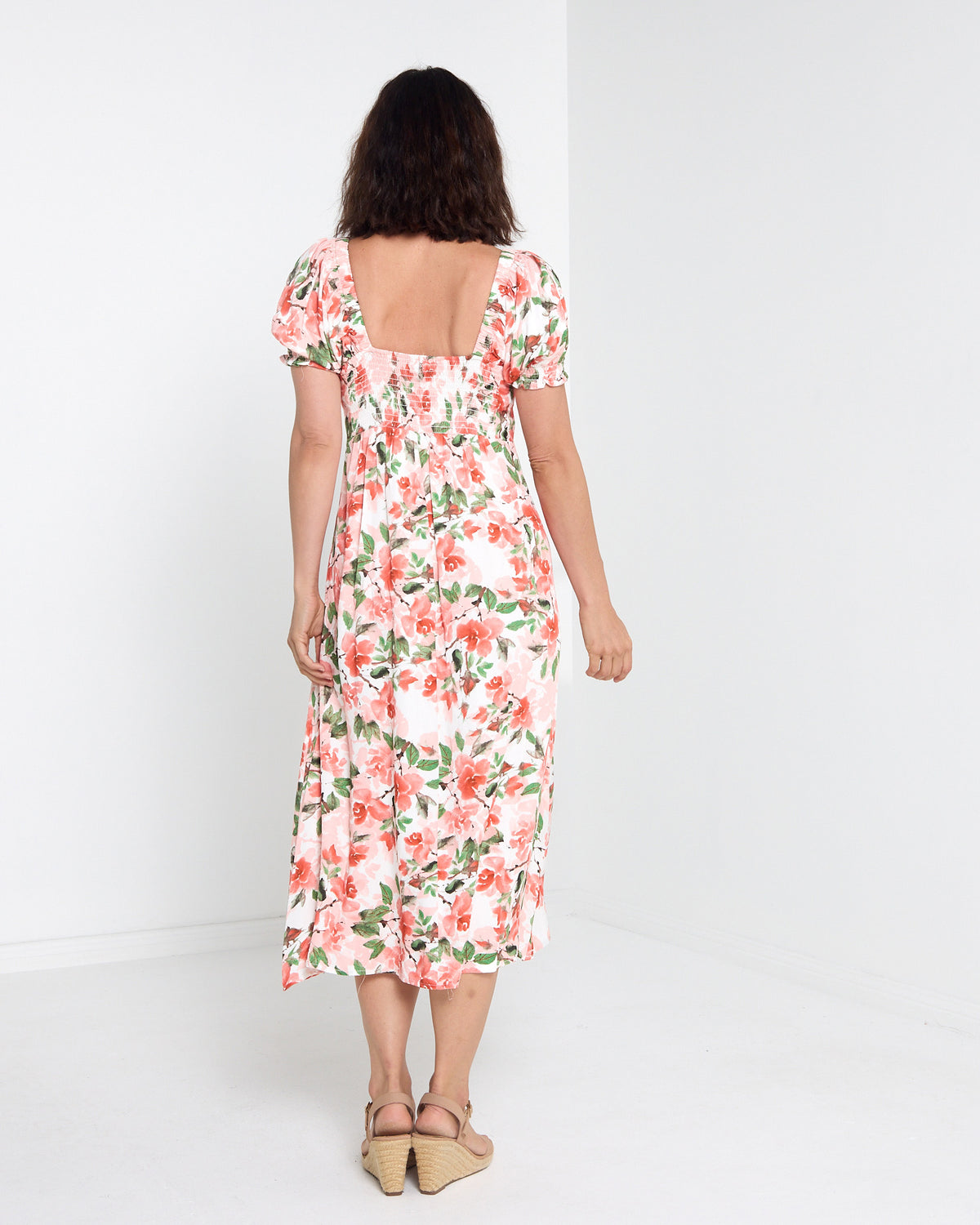 Sunshine Dress - Melon Floral: back view showing smocked yoke detail