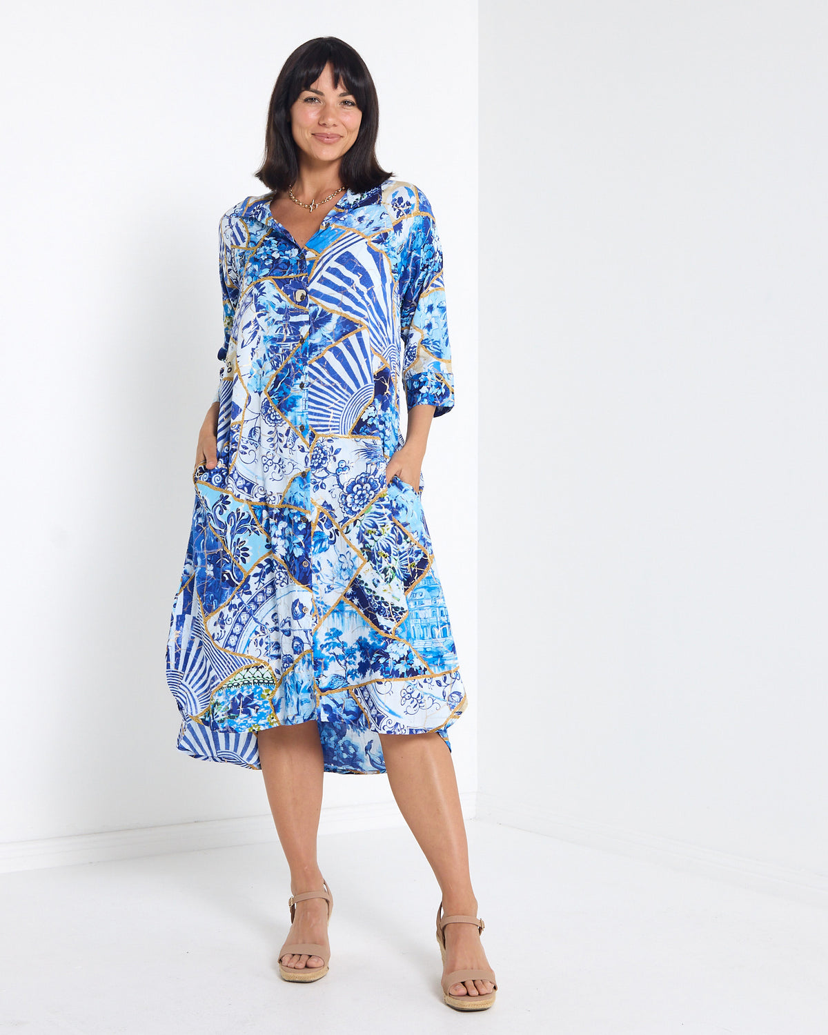 Mia Shirt Dress in patchwork print, front view with hands in pockets