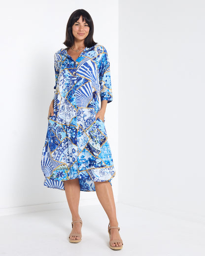 Mia Shirt Dress in patchwork print, front view with hands in pockets