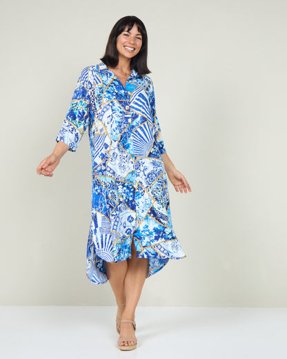 Mia Shirt Dress in patchwork print, front view in motion showing the button front and hem