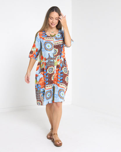Eva Cotton Dress in ripple abstract print, front view in motion showing the relaxed cocoon shape