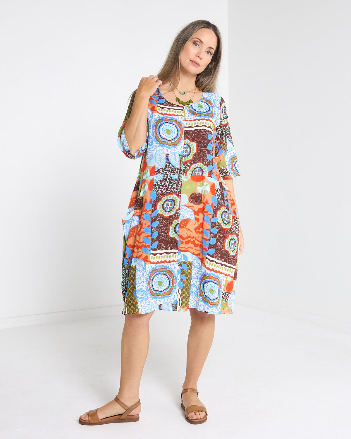 Eva Cotton Dress in ripple abstract print, front view of the patchwork-style abstract print
