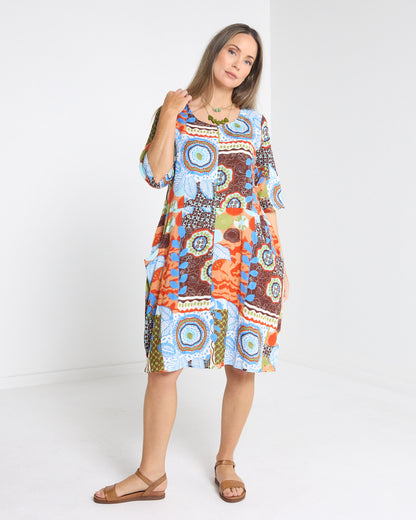 Eva Cotton Dress in ripple abstract print, front view of the patchwork-style abstract print