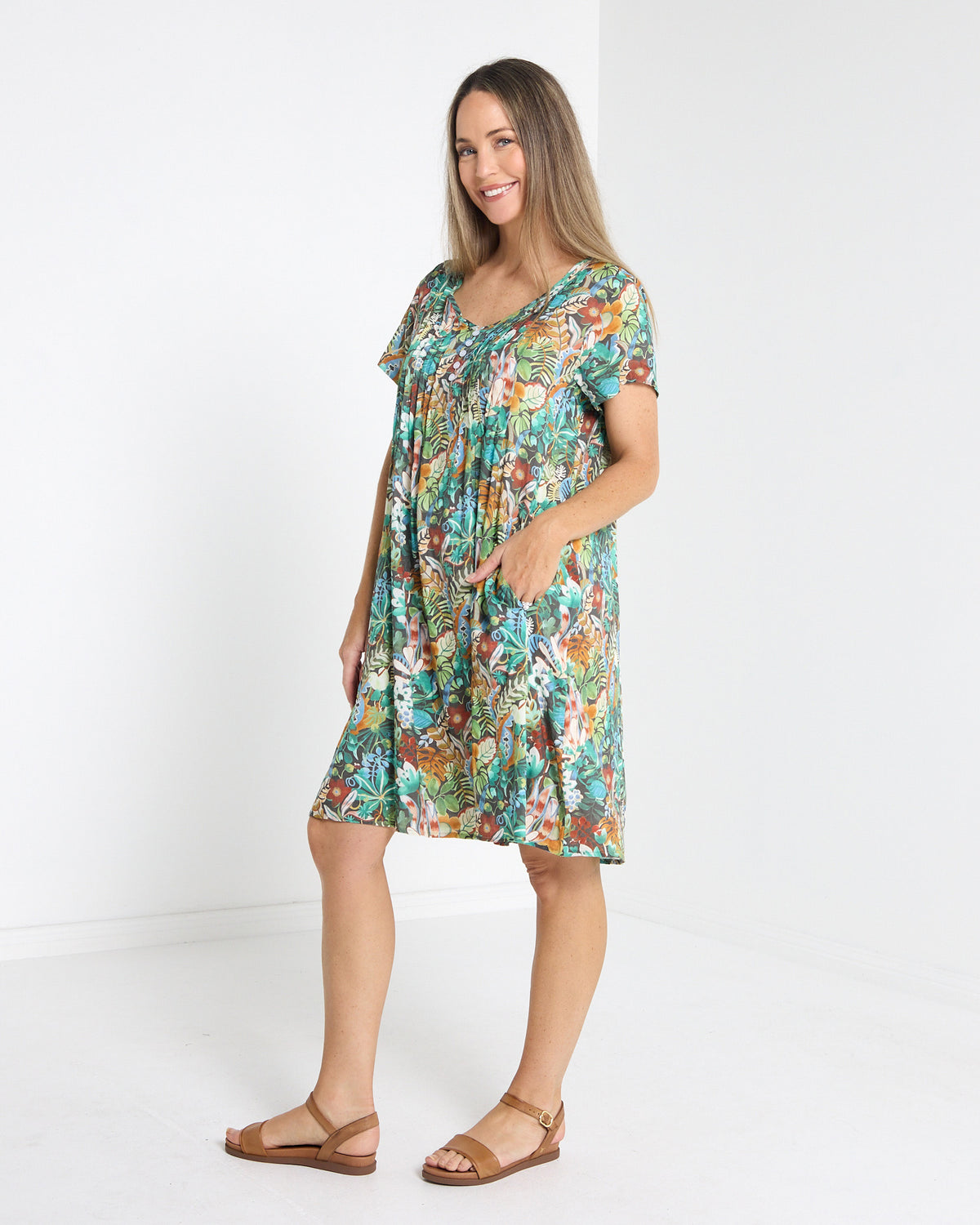 Hayes Cotton Dress in midnight jungle print, three-quarter view with short sleeves and pintuck front