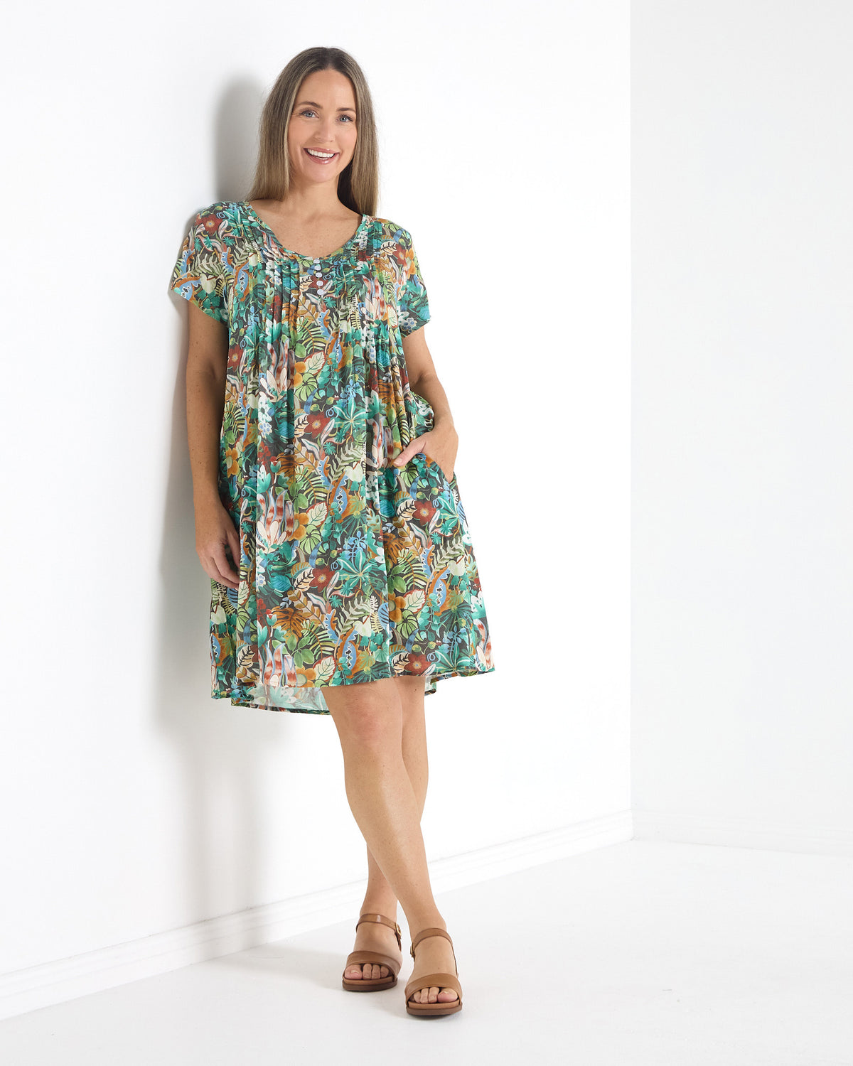Hayes Cotton Dress in midnight jungle print, front view with hand in pocket