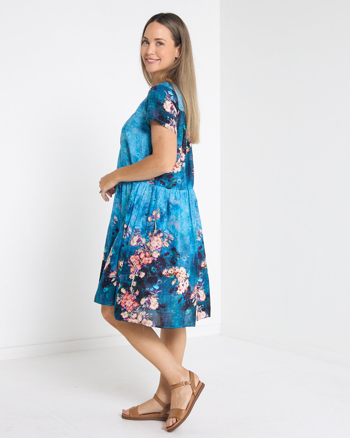 Emery Pintuck Dress in blue lagoon, side view showing the knee length