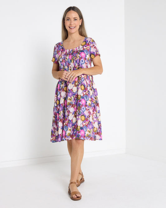 Emery Pintuck Dress in berry pop, full-length front view with short sleeves and pintuck front