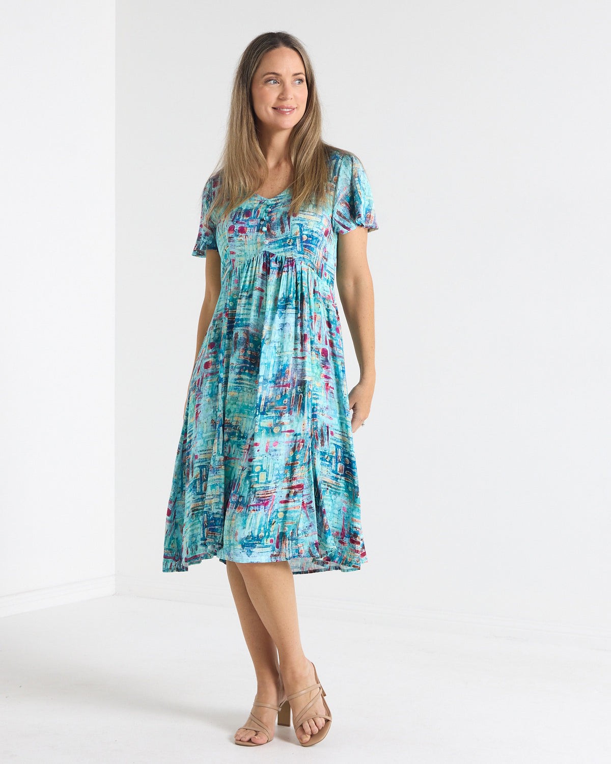 Cornwall Petite Dress in aqua mosaic print, front view with empire seam and gathered skirt