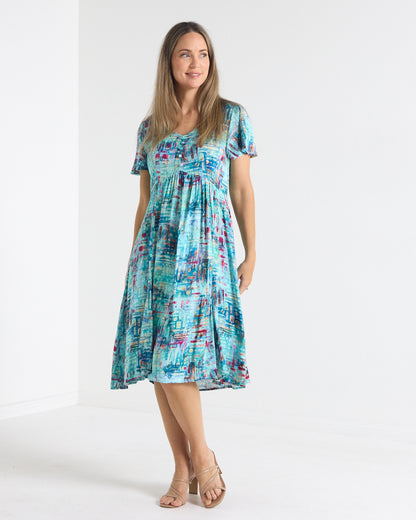 Cornwall Petite Dress in aqua mosaic print, front view with empire seam and gathered skirt