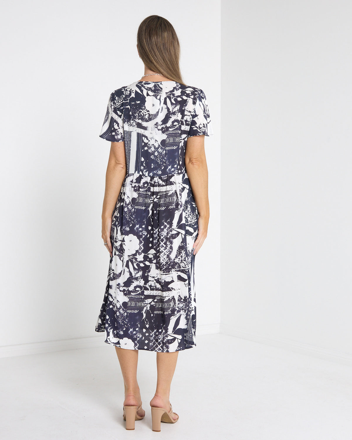 Cornwall Button Midi Dress in ink floral, back view
