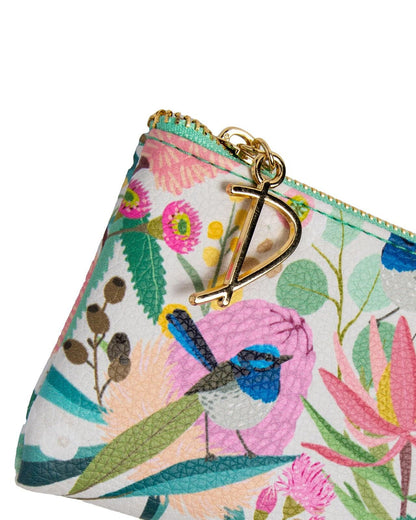 Floral and bird patterned pouch with gold clasp on a white background