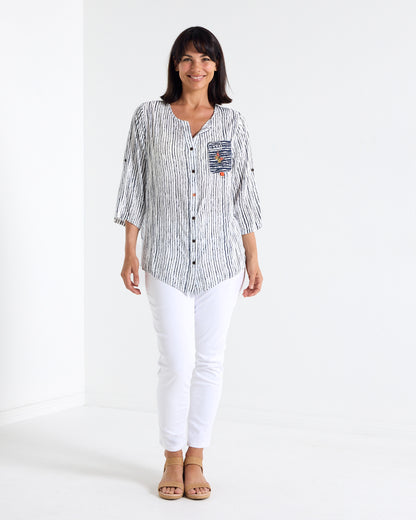 Gifford Stripe Blouse in navy, full-length view styled with white jeans and sandals