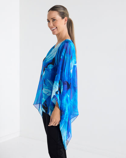 Palermo Silk Top in blue floral, side view showing the draped length