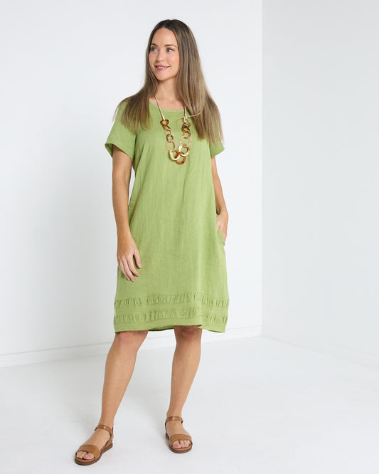 Lux Linen Shift Dress in pistachio, front view with short sleeves and textured trim hem