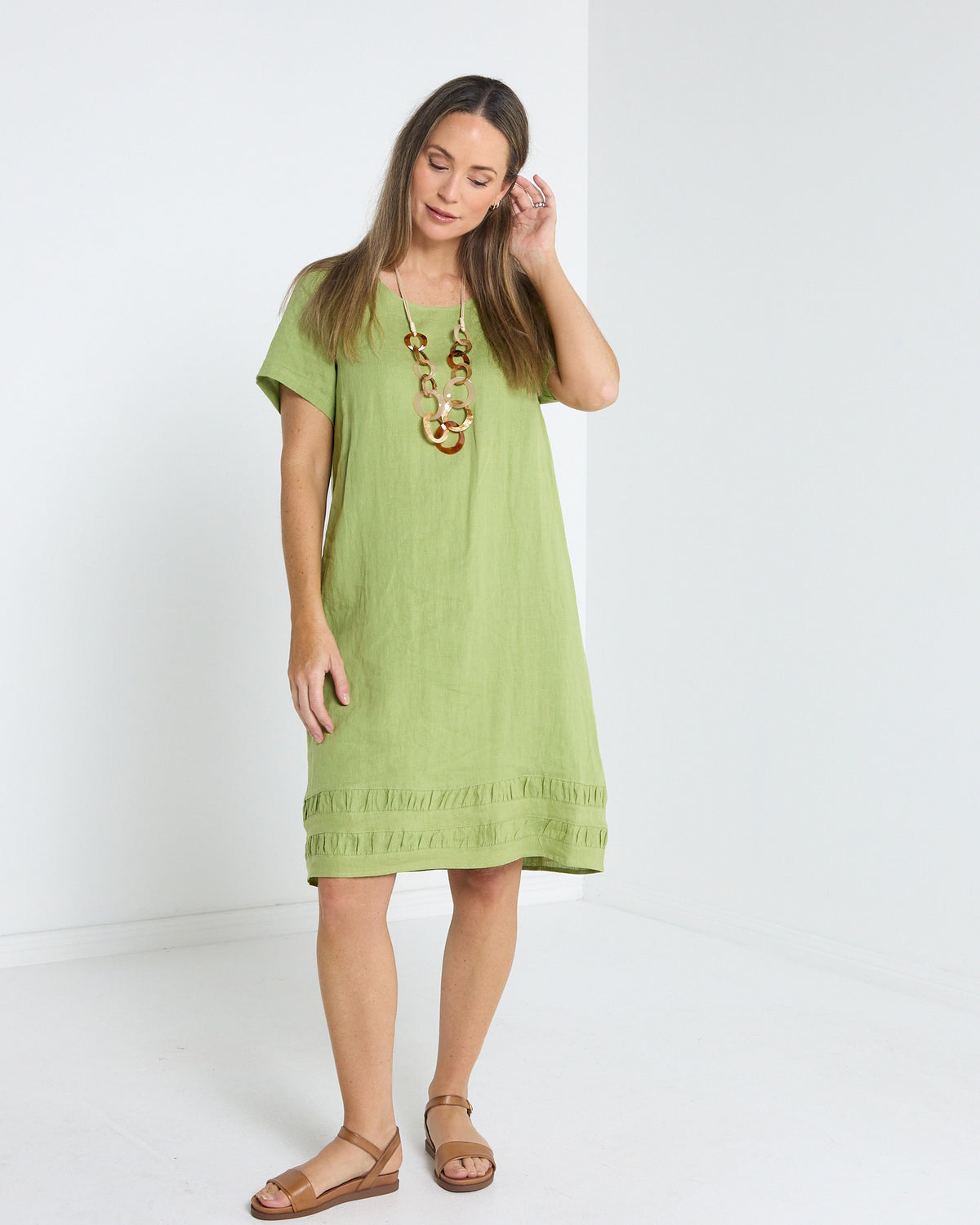 Lux Linen Shift Dress in pistachio, front view styled with a statement necklace