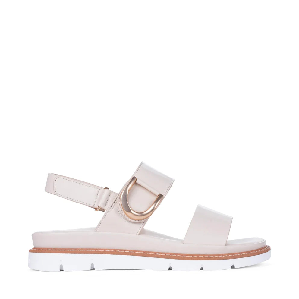 Sana Velcro Sandal in bone, side profile with hook-and-loop ankle strap