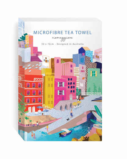 Packaged microfibre tea towel with colorful cityscape design on a white background