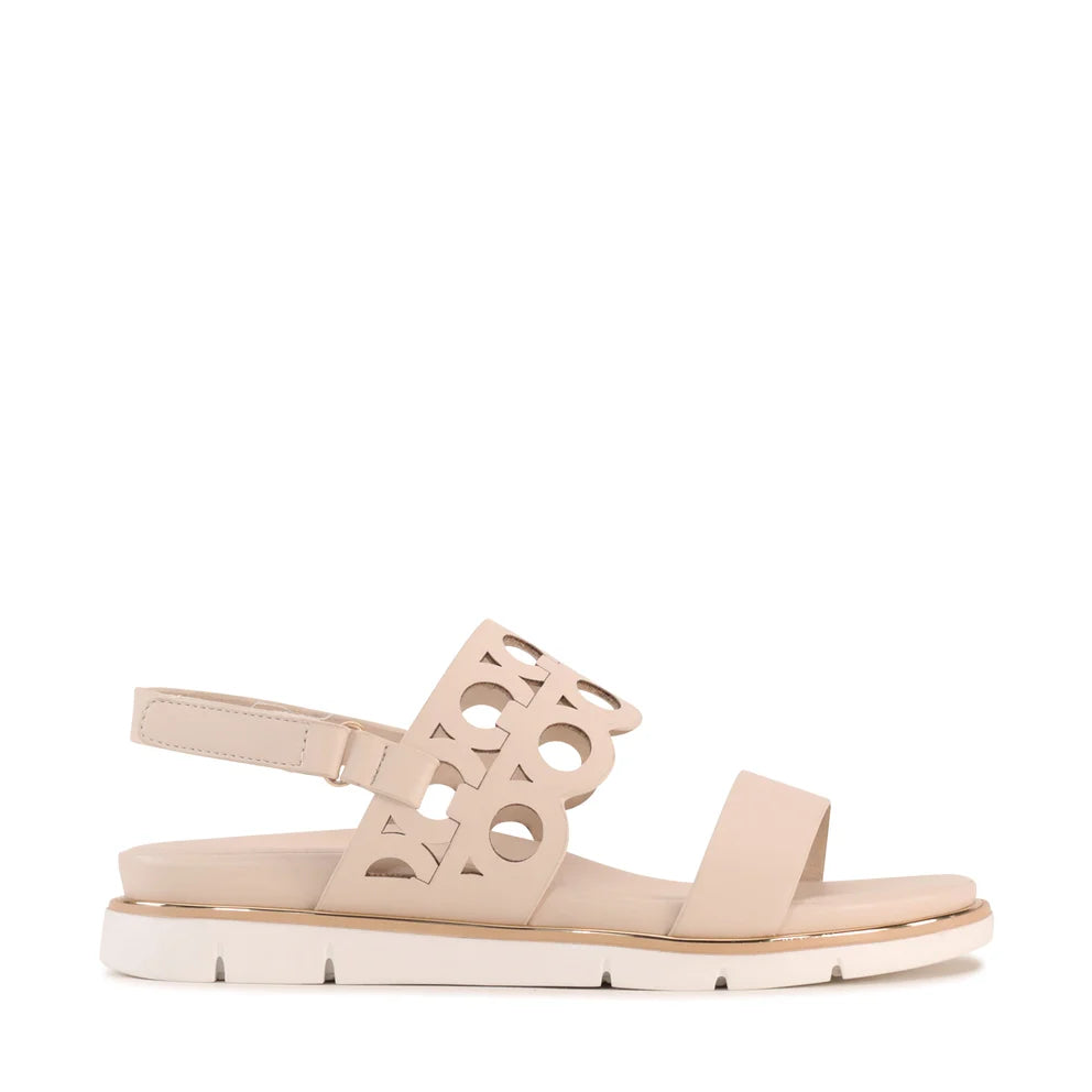 Terica Velcro Sandal in bone, outer side profile showing the hook-and-loop ankle strap