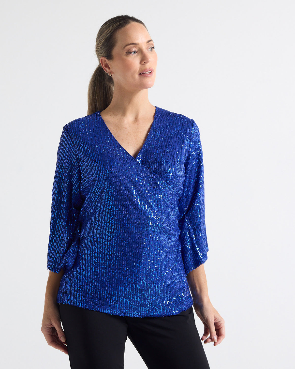 Sparkle Sequin Top in electric blue, close front view of the sequin crossover front