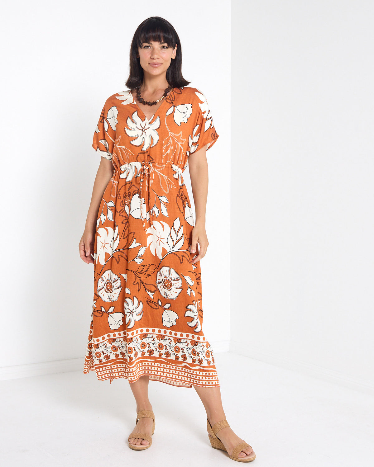Montgomery Dress in toffee, front view with V neckline and tie waist