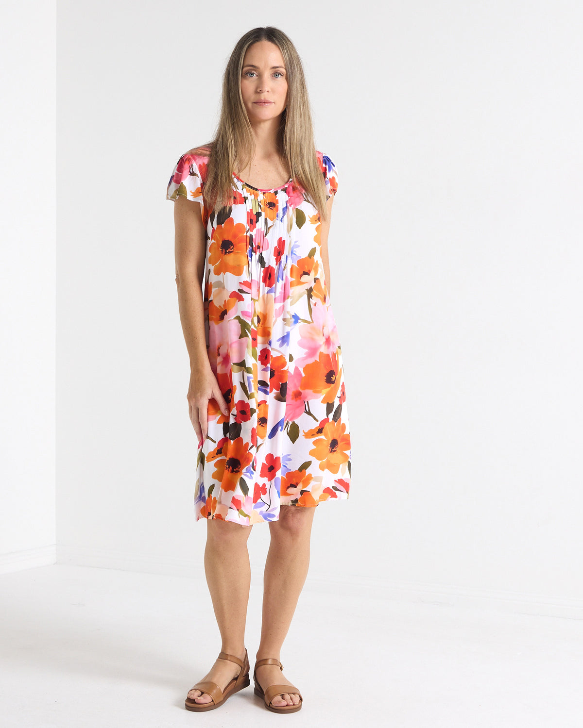 Paige Pintuck Dress in floral print, front view showing the pintuck bodice and relaxed shape