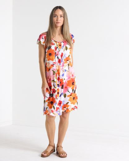 Paige Pintuck Dress in floral print, front view showing the pintuck bodice and relaxed shape