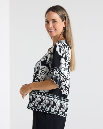 Falkiner Border Print Top in black, side view showing the sleeve and border print