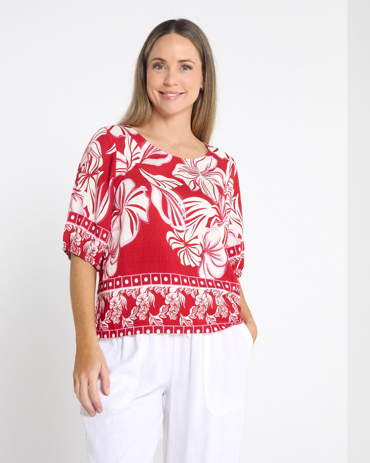 Falkiner Border Print Top in red, front view showing the relaxed boxy fit