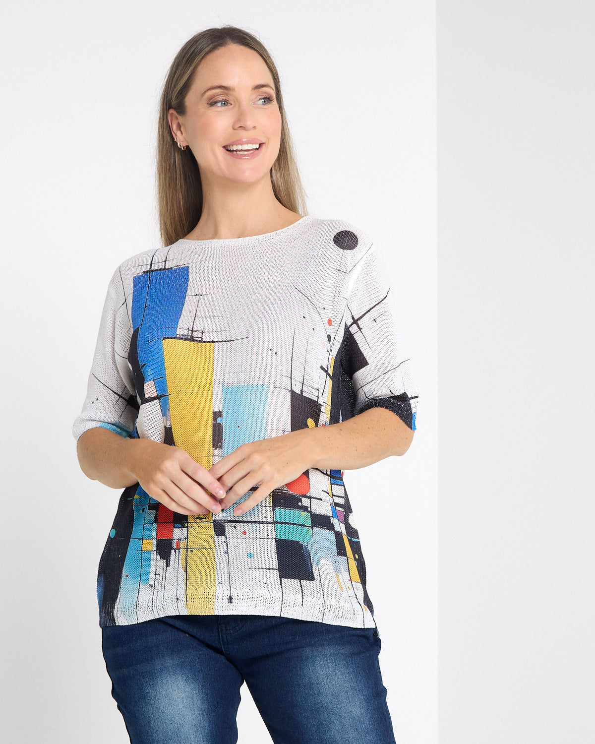Caprina Knit Top in colour blocks, close front view of the knit texture and print