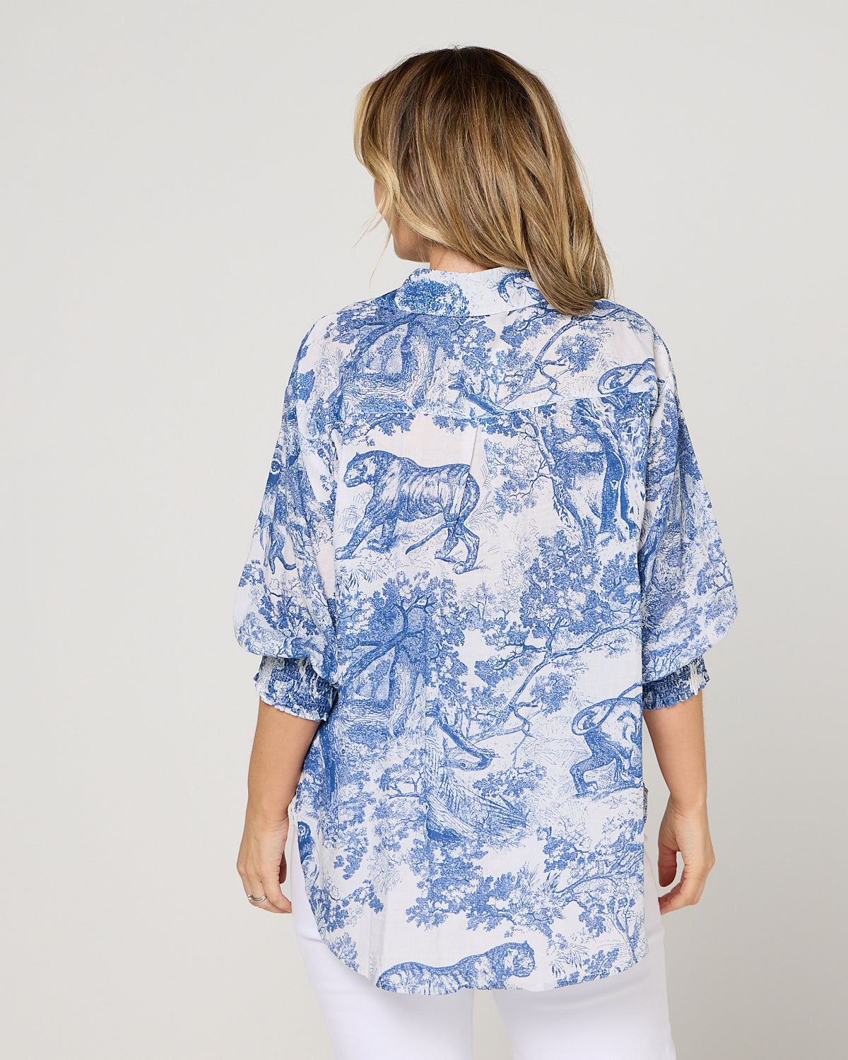 Cora Printed Blouse - French Blue: back view showing inverted pleat yoke